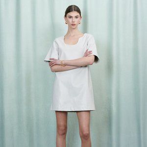 Faux leather t-shirt dress with asymmetric neckline